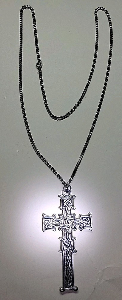 Reversible Silver Tone Celtic Cross on one side Blue color on other side.
