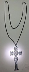Reversible Silver Tone Celtic Cross on one side Blue color on other side.