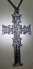 Reversible Silver Tone Celtic Cross on one side Blue color on other side.